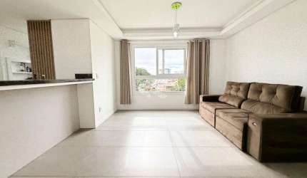 Apartamento 2 dormitórios, 1 suíte, vaga de garagem coberta, próximo ao Parkshopping, no bairro Nossa Senhora das Graças, na cidade de Canoas/RS.
