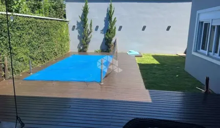 Sobrado Alto Padrão 04 quartos 01 suite com piscina em Canoas