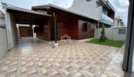 Casa térrea com 134 m² , 3 dormitórios, sendo 1 suíte - Moinhos de Vento, Canoas/RS.