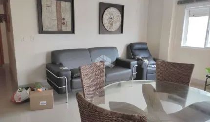 Apartamento com 2 quartos, com vaga de garagem coberta,  no Centro.
