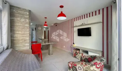 Apartamento com amplo terraço, 2 dormitórios com suíte em Capão da Canoa.