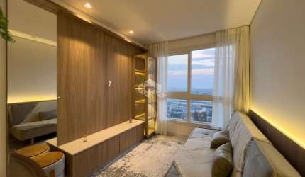 Apartamento de 1 dormitório, mobiliado e decorado, com 46,44m², churrasqueira