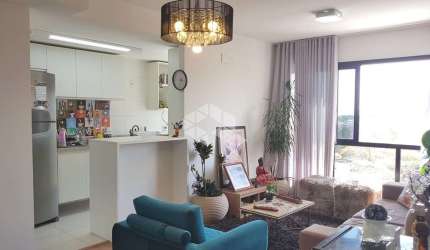 Apartamento 3 dormitórios, sacada e churrasqueira.