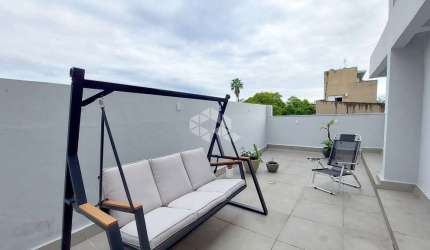 Apartamento garden com 2 dormitórios e 2 terraços e 1 garagem no bairro Farroupilha