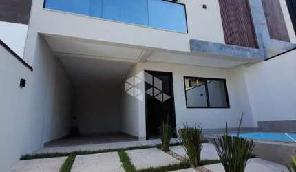 SOBRADO 3 SUÍTES 2 VAGAS E PISCINA a venda por R$ 1.049.000 - CAMBORIÚ SC