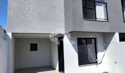 Sobrado com 3 quartos e 140,62m² para vender por R$ 618.000 no bairro Xaxim, em Curitiba-PR.