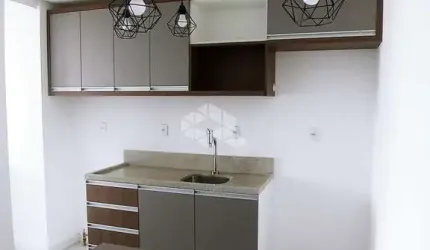 APARTAMENTO SEMIMOBILIADO COM 1 DORMITÓRIO E 1 VAGA ROTATIVA NO BAIRRO LOURDES EM CAXIAS DO SUL