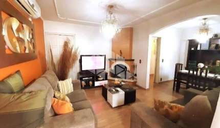 Apartamento semimobiliado de 02 dormitórios e dependência de empregada à venda no bairro Pio X, Caxias do Sul.