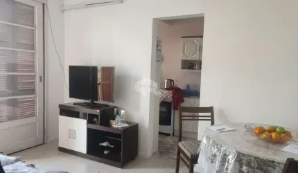 Apartamento de um dormitório com suíte no centro histórico