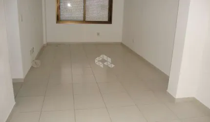 apartamento um dormitório andar alto com piso porcelanato foi todo reformado