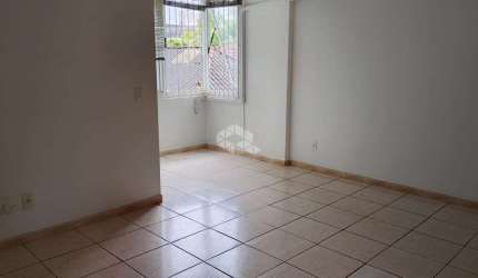 Credito Real vende aconchegante apartamento de 2 dormitórios, com churrasqueira  no Jardim Botânico - Porto Alegre/RS