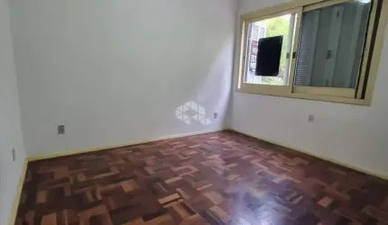 Apartamento para venda de frente com 2 dormitórios no bairro Jardim Botânico em Porto Alegre/RS.