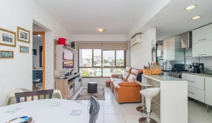 Excelente apartamento de 02 dormitórios com 01 suíte com  65,31m² privativos e 01 vaga coberta e escriturada no Passo da Areia em Porto Alegre,