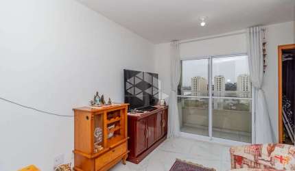 Apartamento de 2 Dormitórios  com Sacada e Churrasqueira  Vaga coberta no Porto Coimbra