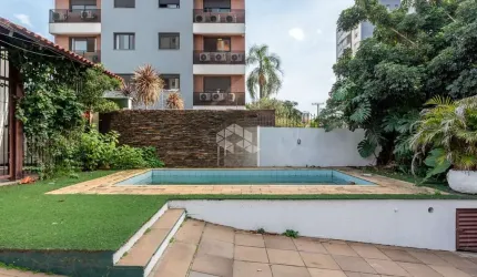 Casa com 160m² e 3 dormitórios, 1 suíte, 3 vagas no bairro Passo da Areia em Porto Alegre