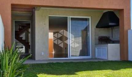 Casa geminada de 03 dormitórios em xangri la