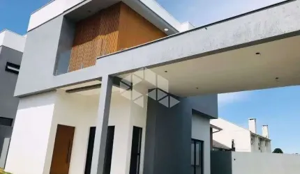 Sobrado geminado com 3 dormitórios, sendo 1 suíte, a venda no bairro Universitário em Lajeado/RS