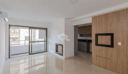 Apartamento em prédio novo em frente a mercado com uma ótima localização!