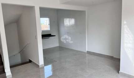 Casa sobrado em condomínio no GUARUJÁ- 2 dormitórios 3 vagas - Vila Alice - Guarujá