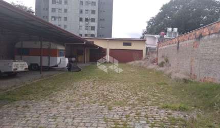 Terreno, estacionamento, oficina mecânica à venda no bairro Partenon - Porto Alegre/RS
