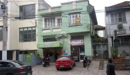 Casa comercial e residencial Glória Térreo, duas lojas locadas para lotérica e salão de beleza, nos fundos apartamento 2 dormitório e 3 dormitórios
