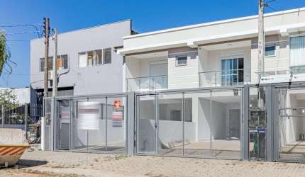 Sobrado novo, no bairro Sarandi, 3 dormitórios, 1 suíte e  sacada frontal