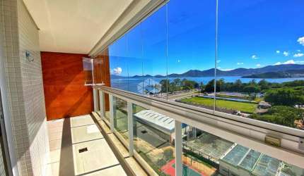 Apartamento semimobiliado com vista para o mar, com 2 dormitórios sendo 2 suítes, 1 vaga de garagem no bairro Agronômica em Florianópolis/SC.
