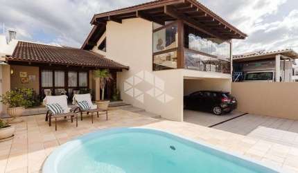 Casa semimobiliada com vista para o mar com 3 dormitórios/quartos A Venda - Balneário, Florianópolis SC