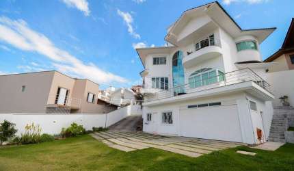 Casa residencial mobiliada com 4 suítes, sendo 2 suítes master com closet A Venda - Carvoeira, Florianópolis SC