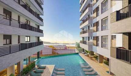 APARTAMENTO COM 3 QUARTOS SENDO 1 SUÍTE E 2 DEMI-SUÍTES 2 VAGAS DE GARAGEM NO BAIRRO PRAIA COMPRIDA EM SÃO JOSÉ/SC