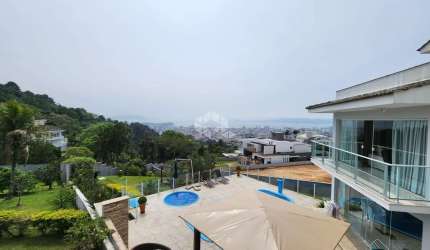CASA EM CONDOMINIO DE LUXO COM 4 QUARTOS SENDO 2 SUÍTES 2 VAGAS DE GARAGEM NO BOSQUE DAS MANSÕES EM SÃO JOSÉ/SC