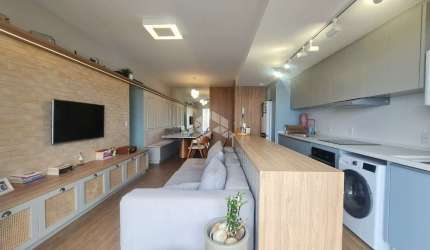 APARTAMENTO SEMIMOBILIADO COM 3 QUARTOS SENDO 1 SUÍTE E 1 VAGA DE GARAGEM EM BARREIROS SÃO JOSÉ/SC