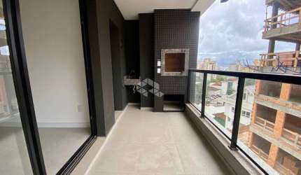 APARTAMENTO DE ALTO PADRÃO COM 3 SUÍTES E VISTA PARCIAL PARA O MAR EM FLORIANÓPOLIS