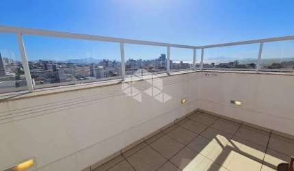 COBERTURA COM 4 QUARTOS SENDO 3 SUÍTES E 3 VAGAS DE GARAGEM NO BALNEÁRIO DO ESTREITO EM FLORIANÓPOLIS/SC