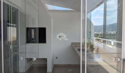 COBERTURA COM 3 QUARTOS SENDO 1 SUÍTE 2 VAGAS DE GARAGEM NO CÓRREGO GRANDE EM FLORIANÓPOLIS/SC
