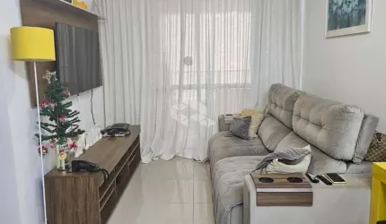 APARTAMENTO SEMIMOBILIADO COM 2 QUARTOS SUÍTE E SACADA COM CHURRASQUEIRA EM BARREIROS SÃO JOSÉ/SC