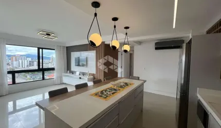 APARTAMENTO SEMIMOBILIADO COM VISTA PARA O MAR COM 3 QUARTOS SENDO 1 SUÍTE E 2 VAGAS DE GARAGEM NO BALNEÁRIO EM FLORIANÓPOLIS/SC