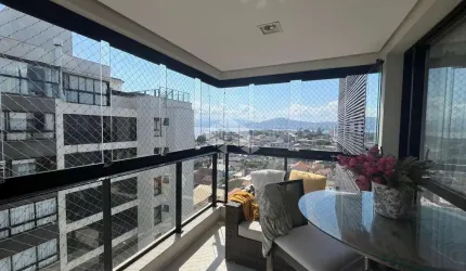 APARTAMENTO SEMIMOBILIADO COM VISTA PARA O MAR COM 2 QUARTOS SENDO 1 SUÍTE E 2 VAGAS DE GARAGEM NO BALNEÁRIO EM FLORIANÓPOLIS/SC