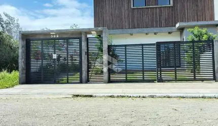 Casa Sobrado com 2 suítes, 1 vaga, 92,18 m² privativos no loteamento Jardim Panorâmico, Centro de Garopaba SC