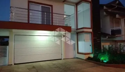 Casa 04 dormitórios para vender no condomínio Villa Lucchesi em Gravataí