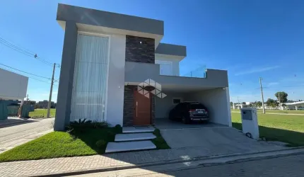 Casa à venda em condomínio fechado em Eldorado do Sul com 3 dormitórios e 2 vagas