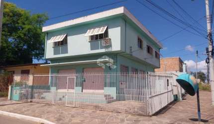 Casa à venda com 3 dormitórios , 1 vaga garagem, com amplo salão no térreo para uso comercial