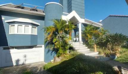 Casa à venda com 3 quartos, 2 vagas no centro de Guaíba com vista panorâmica para o Guaíba