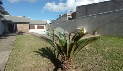 Casa no bairro Niterói com 4 dormitórios, 2 suítes e piscina com terreno 11x50