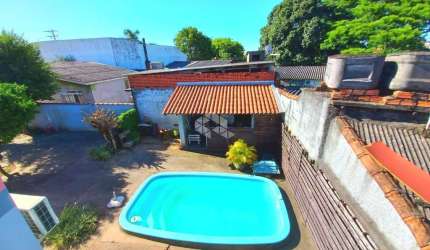 Casa térrea 3 dormitórios bairro igara Canoas/RS.