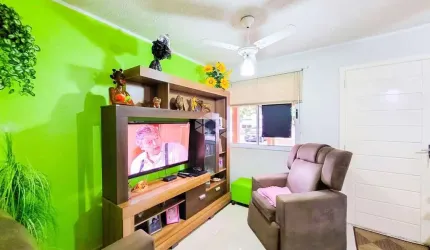 Sobrado em condomínio 108m² 03 dormitórios 02 vagas cobertas no Bairro Igara, em Canoas