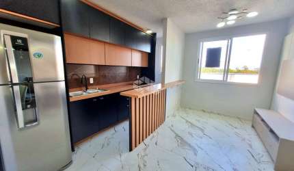 Apartamento 2 dormitórios condomínio fechado com elevador Bairro Olaria com vaga