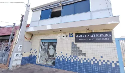 Sobrado com Loja comercial e residencia com 3 dormitorios nos fundos na Av. A j renner.