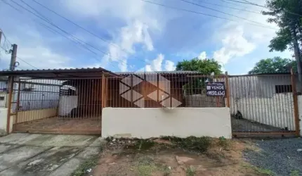 Terreno com 2 casas de madeira com 60,00m² de área construída cada uma em Niterói Canoas