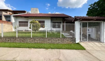 Casa térrea com 3 dormitórios e 1 suíte no bairro Igara - Canoas